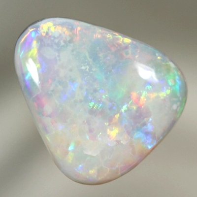 SOLID SEMI BLACK OPAL Very brightly in rolling flashes 